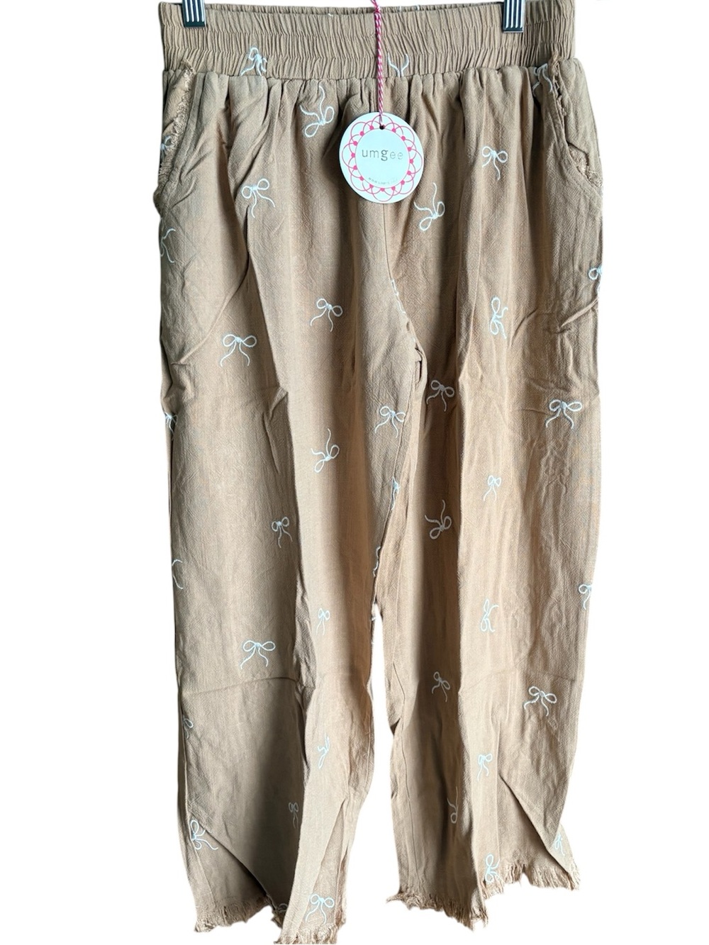 Umgee Cropped Eyelash Hem Tan With Embroidered Bow-Design- Elastic Waist Pants